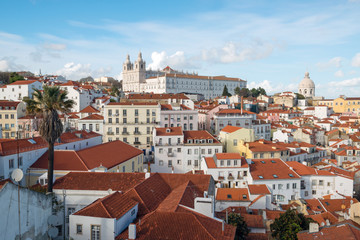 Fototapeta na wymiar Beautiful view of old city from Alfama with cloudy sky in Lisbon at dusk, Portugal