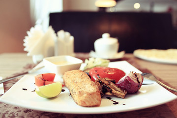 Salmon grill restaurant serving