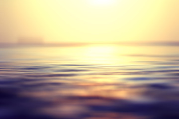 Obraz premium blurred background sunset on the sea