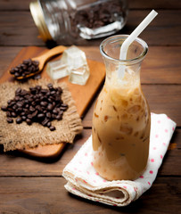 Glass Of Cold Coffee on wood