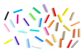 Colorful chalks seamless pattern on white background