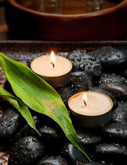 zen basalt stones and candle