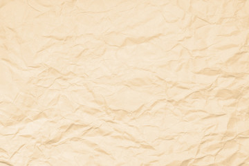 Cream paper sheet. Closeup recycled crumpled cream paper texture. Recycled crumpled cream paper background with copy space for text or image.