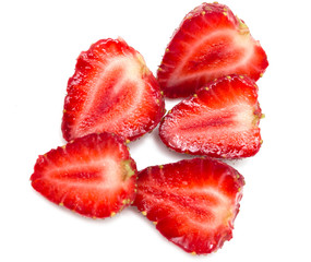 strawberry halves on a white background