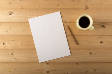 blank sheet with pencil and cup of coffee
