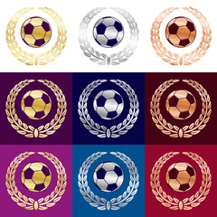 Soccer football balls in three different metal color gold, silver, bronze