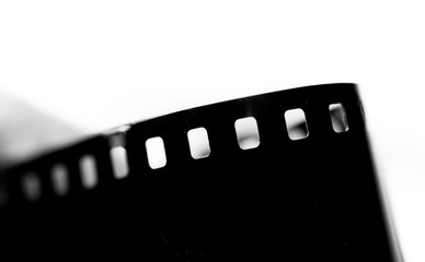 Close-up of a roll 35 mm photographic film; vintage tone style