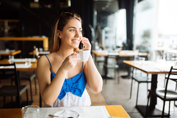 Beautiful woman talking on cell phone
