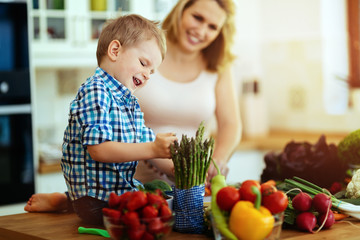 Mother and child preparing lunch