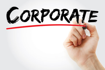 Hand writing CORPORATE with marker, business concept