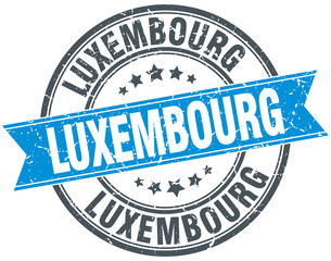 Obraz premium Luxembourg blue round grunge vintage ribbon stamp