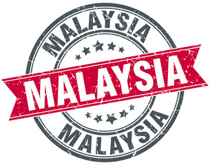 Malaysia red round grunge vintage ribbon stamp