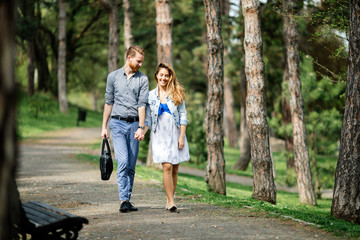 Fototapeta premium Beautiful couple bonding in park