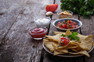Mexican corn chips nachos with salsa dip