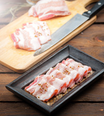 Pork belly sliced on wood