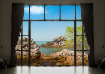 Silhouettes of window with a curtain, sea view background