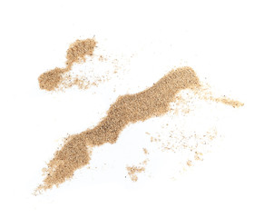 closeup of a pile of sand on a white background