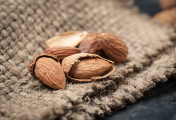 Almonds on sack background,Selective focus