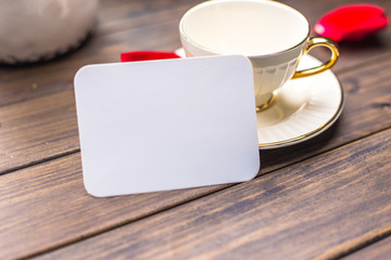 white blank card on tab le in cafe