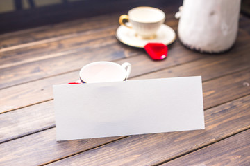 white blank card on tab le in cafe