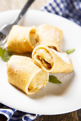 Pancakes with baked apple filling