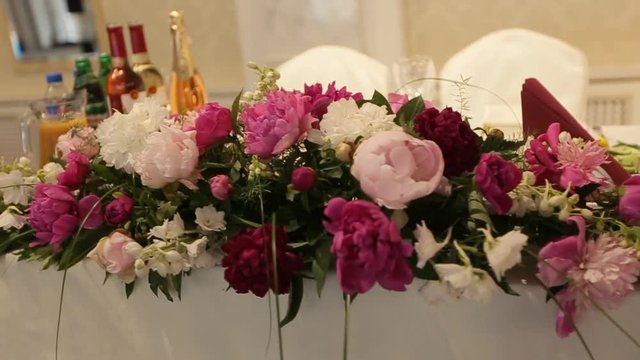 Beautiful wedding decorations to wedding. Beautiful flowers are on the table.