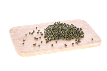 mung beans  on chopping board white background