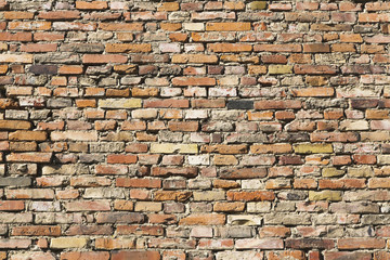 old brick wall inlaid regularly