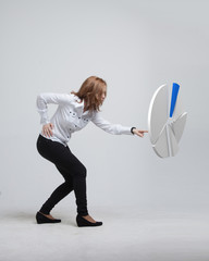 Woman shows a pie chart, circle diagram. Business analytics concept.
