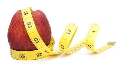 fresh apple with measuring tape isolated