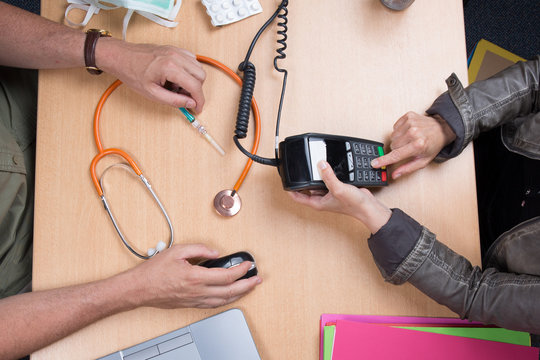 Woman Paying The Doctor With Credit Card Flat Lay