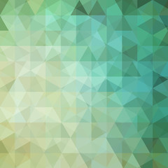 Fototapeta na wymiar abstract background consisting of green triangles