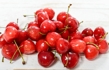 fresh cherries on wooden table