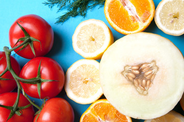 Healthy vegetables and fruits on a blue background