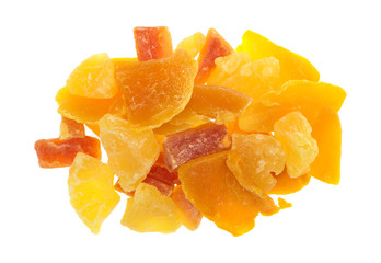 Sugared pineapple, mango and papaya on a white background top view.