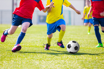 Children Playing Soccer Football Match. Sport Soccer Tournament