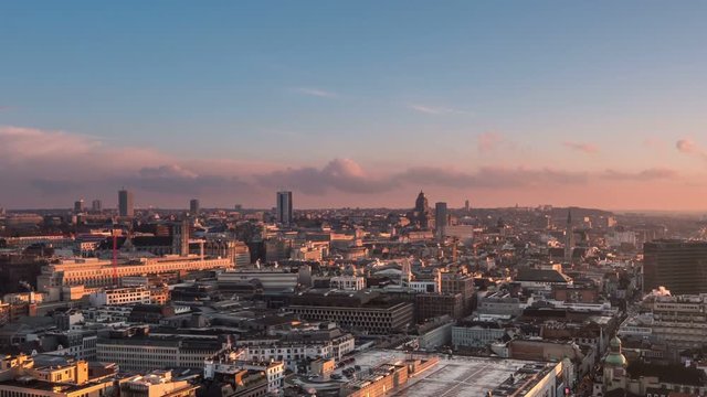 time lapse of brussels skyline from day to night zoom out