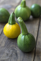 Fresh zucchini  on wooden table