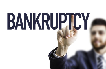 Business Man Pointing the Text: Bankruptcy
