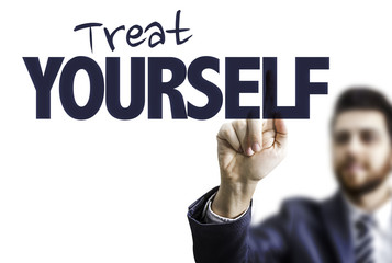Business Man Pointing the Text: Treat Yourself