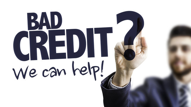 Business Man Pointing the Text: Bad Credit? We Can Help!