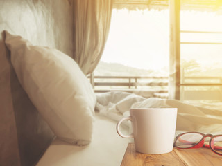 Nice morning bedroom with coffee