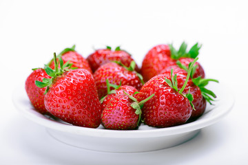 Strawberries on a white plate