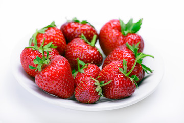 Strawberries on a white plate