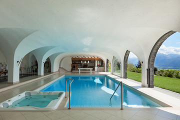 Obraz na płótnie Canvas Indoor swimming pool of a villa