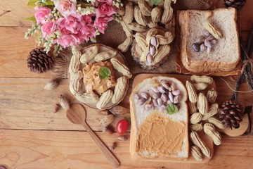 Peanut butter smeared on bread is delicious.
