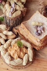 Peanut butter smeared on bread is delicious.