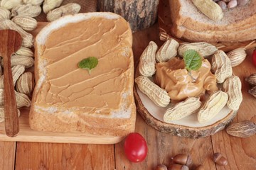 Peanut butter smeared on bread is delicious.