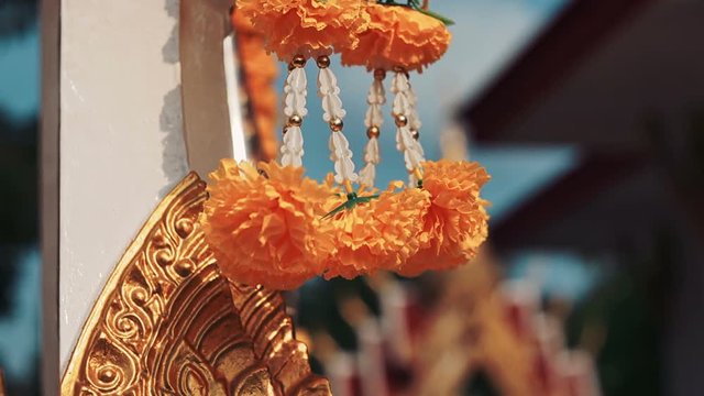 Flover Decoration In Buddha Temple, Buddha temple and blue sky background. Closeup