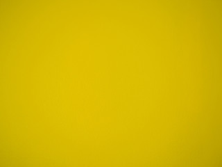 Obraz premium Abstract yellow cement wall background